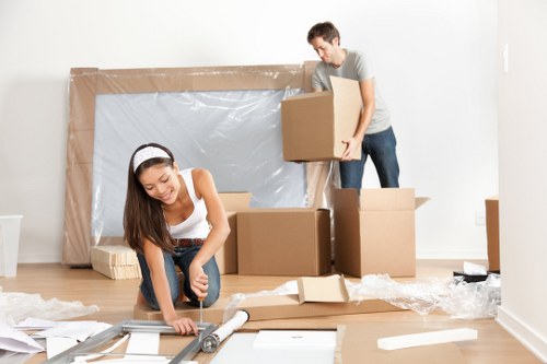 Removal team loading furniture for a house move in Palmers Green