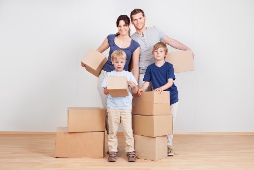 Packed boxes and furniture prepared for a Palmers Green apartment move